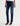 A model wearing a pair of dark blue straight-leg jeans, styled with a white top and brown suede high-heeled boots, photographed against a clean white studio background.