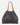 A grey leather purse with cognac suede straps on a white background