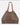 a light brown leather bag with cognac suede straps on a white background