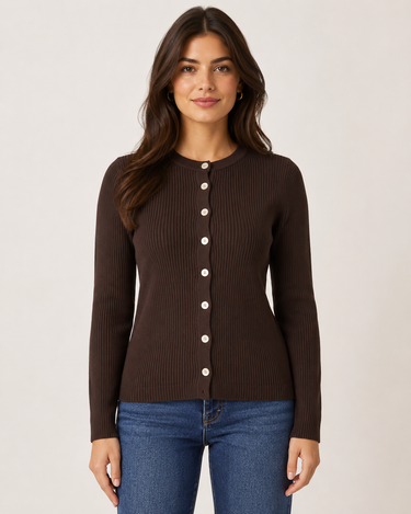 A woman modeling a dark brown ribbed knit cardigan sweater with a button-down front, paired with blue jeans, against a plain light beige background.