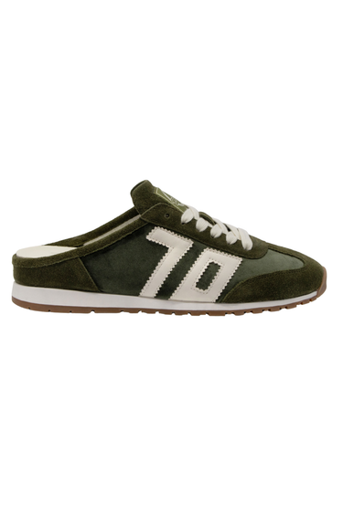 A side view of a velvet green backless shoe with white lettering that reads “70”