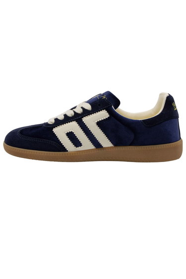 The side of a velvet blue sneaker with ‘70’ in white on the side on white background.