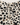 Close-up of Bella Dahl Painted Spots top showing three-button back neckline and keyhole detail