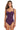 A woman modeling a ruched one-piece swimsuit in a deep purple color, shown against a plain white background.