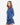 Woman wearing a blue dress with long sleeves on a white background
