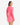 Woman wearing a pink dress with long sleeves on a white background