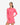 Woman wearing a pink hoodie dress on a white background