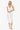 Woman wearing a white crochet dress on a white background