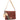 A brown embossed leather shoulder bag with a floral pattern, featuring a light beige leather strap, a colorful woven strap detail, and a matching leather hangtag on a white background.