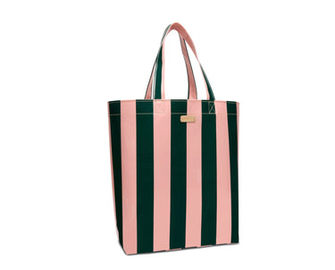 A tote bag with vertical pink and dark green stripes, featuring dual top handles and a small gold metal logo plaque on the front.