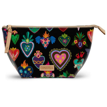 A black zippered cosmetic pouch featuring a colorful Mexican-style Sacred Heart of Guadalupe pattern, with a beige leather zipper pull and a Consuela brand label.