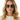Woman wearing sunglasses with a neutral background