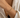 a woman wearing a 4mm gold beaded bracelet on a neutral background