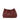 A burgundy leather clutch on a white background