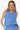 Woman wearing a blue patterned sleeveless top and pants on a white background