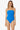 Woman wearing a blue strapless swimsuit on a white background