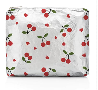 A metallic silver medium zippered pouch with red cherries on it on a white background