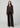 Chocolate brown button-front cardigan styled with matching wide-leg velvet pants and pointed-toe shoes on a model.