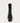 The image shows the back of a black leather heeled ankle boot with a zipper detail on a white bckground.