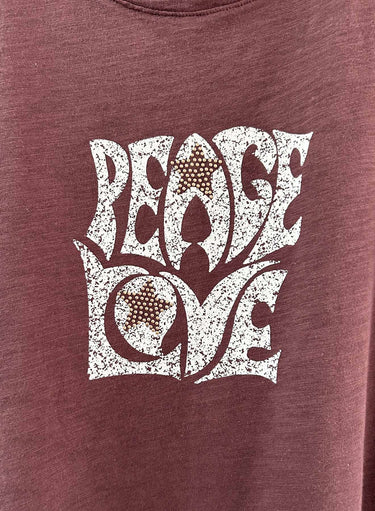 Maroon t-shirt with white 'Peace Love' design featuring hearts and leaves.