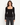 A woman wearing a black square neck long sleeve top and black jeans on a white background