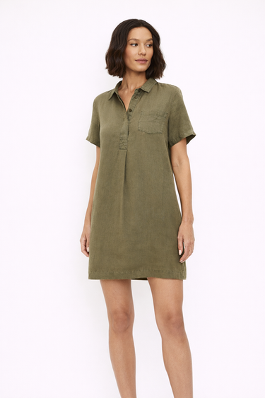 Woman wearing a green dress on a white background