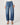 Person wearing blue jeans on a white background