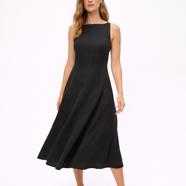 Black sleeveless dress worn by a model on a white background