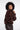 Woman wearing a brown fur jacket on a white background