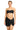 Woman wearing a black strapless top and black shorts on a white background