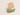 Gold-tone hoop earrings with green stone inlays, displayed on a kraft paper card labeled 'Scott Curated Wears' against a light beige background.