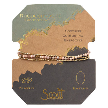 Jewelry set with bracelets and necklace on a branded card, featuring the brand 'Scout'.
