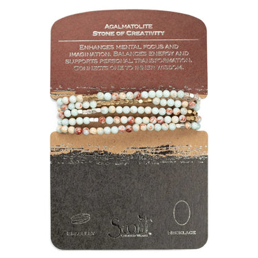 Set of beaded bracelets on a branded card with text about agalmatolite stone.