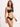 Woman wearing a black bikini against a light background