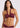 The front view of a wrap halter burgundy swim top on a model on a white background