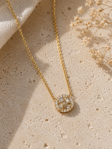 A cubic zirconia circle pendant necklace