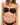 Black bikini with green and gold accents on a beige background