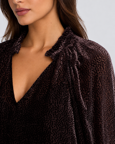 A textured black dot sheer chocolate blouse with blousy sleeves