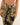 Leopard print wrap with black tie detail on a neutral background