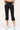 Black capri pants worn by a person on a white background
