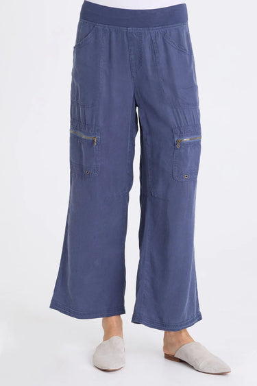 A close up of the blue twill cargo pants on a white background