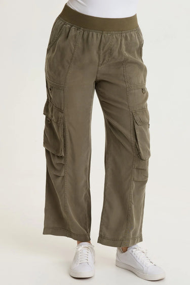 a woman wearing cropped twill cargo pants in moss green