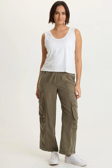 A woman wearing a cropped twill cargo pant in moss green