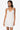 woman wearing a white slip on a white background