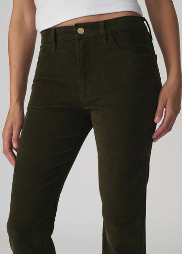 Close-up of Joe’s Jeans Inez Corduroy Pant in Olive showing fine-wale corduroy, waistband and front pockets