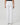 White pants worn by a person on a light gray background