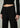 Close-up of Joe’s Jeans Lou Lou Low Rise Jean in Black showing waistband, button closure and front pockets