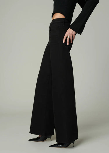 Side view of Joe’s Jeans Lou Lou Low Rise Wide Leg Jean in Black showing relaxed fit and full-length wide leg