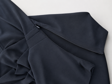 a close up at the side zipper on the blouse