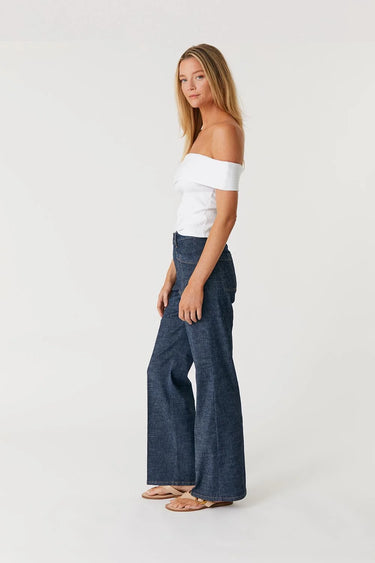 Side view of Level 99 Sarah Full Length Pant in Stargazer showing full-length wide leg fit